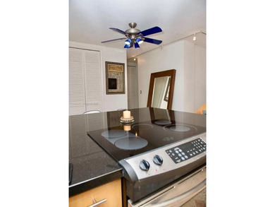 Fully furnished corner unit with parking, move-in ready and