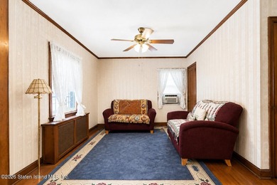 A detached two family home set on an expansive, street to street - photo 11