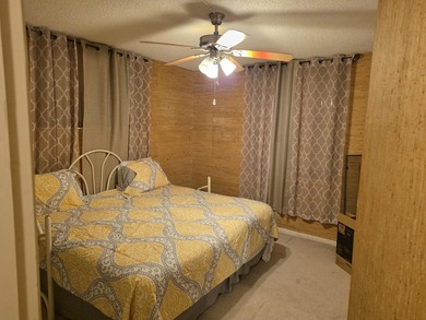 COZY AND SPACIOUS 2ND FLOOR CORNER UNIT BACKED UP ON GOLF COURSE - photo 2