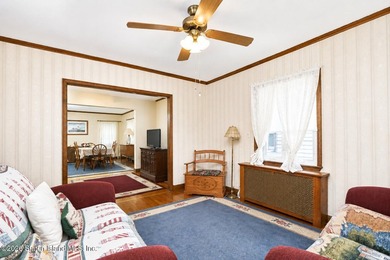 A detached two family home set on an expansive, street to street - photo 12