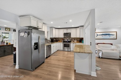 This home is BEAUTIFUL! Fully remodeled in 2019 and nestled in - photo 13