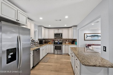 This home is BEAUTIFUL! Fully remodeled in 2019 and nestled in - photo 14