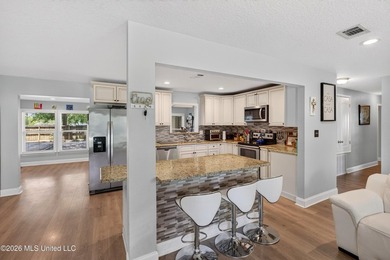 This home is BEAUTIFUL! Fully remodeled in 2019 and nestled in - photo 15