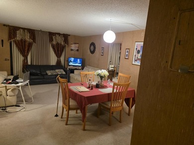 COZY AND SPACIOUS 2ND FLOOR CORNER UNIT BACKED UP ON GOLF COURSE - photo 6
