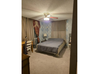 COZY AND SPACIOUS 2ND FLOOR CORNER UNIT BACKED UP ON GOLF COURSE - photo 7