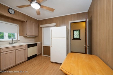 A detached two family home set on an expansive, street to street - photo 19