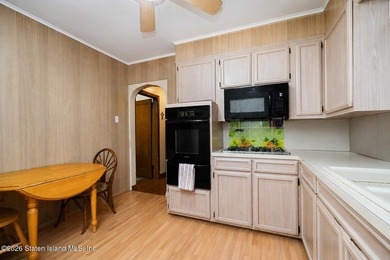 A detached two family home set on an expansive, street to street - photo 21