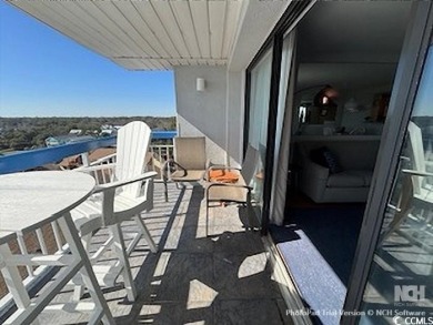 MUST SEE FOREVER VIEWS FROM THIS IMPECCABLE OCEAN CONDO LOCATED