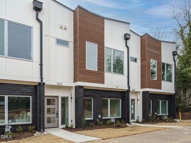Move-in ready this exceptional townhome at 1533 Urban Trace Lane