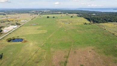 150 acres m/l with Texanna Road frontage and paved 424 Rd along - photo 3
