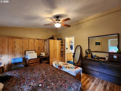 Tucked away among the trees on 1.16 private acres with a Large - photo 12