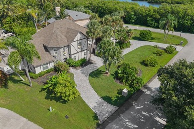 Experience refined coastal living in this stunning Tudor-style - photo 3