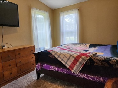 Tucked away among the trees on 1.16 private acres with a Large - photo 16