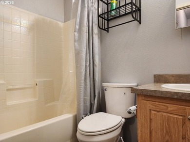 Tucked away among the trees on 1.16 private acres with a Large - photo 18