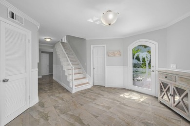 Experience refined coastal living in this stunning Tudor-style - photo 9