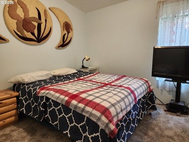 Tucked away among the trees on 1.16 private acres with a Large - photo 19