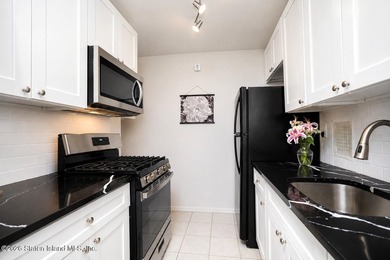 Located on the edge of the Grand Clove Lake Park sits this all - photo 15