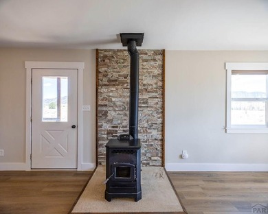 Perched on 9 scenic acres just minutes from Salida, this - photo 4