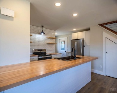 Perched on 9 scenic acres just minutes from Salida, this - photo 6