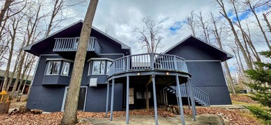 Large Michaywe home on a quiet cul-de-sac set in the wood. This - photo 1