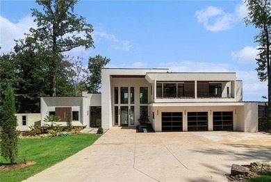 Experience the pinnacle of lakeside luxury at 2730 Emerald Drive - photo 2