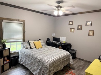 This home has 3 bedrooms and 2 bathrooms, the split-bedroom - photo 12