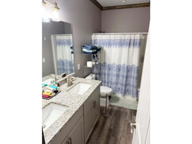 This home has 3 bedrooms and 2 bathrooms, the split-bedroom - photo 14