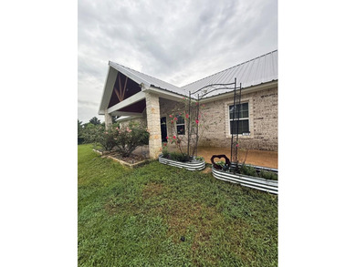 This home has 3 bedrooms and 2 bathrooms, the split-bedroom - photo 17