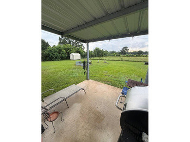 This home has 3 bedrooms and 2 bathrooms, the split-bedroom - photo 18