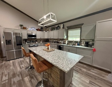 This home has 3 bedrooms and 2 bathrooms, the split-bedroom - photo 23