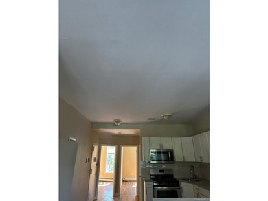 This meticulously maintained mixed-use building offers the - photo 13