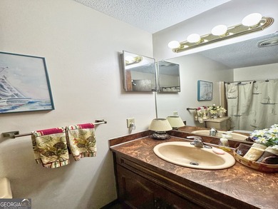 Escape to lakeside living in this beautiful home featuring its - photo 19