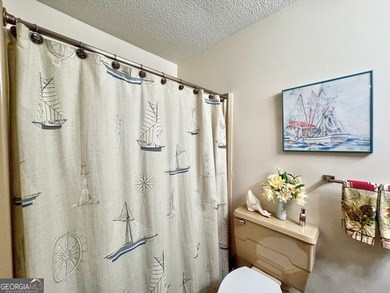 Escape to lakeside living in this beautiful home featuring its - photo 20
