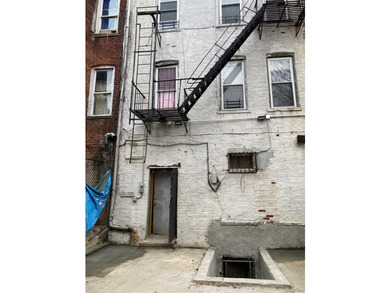 This meticulously maintained mixed-use building offers the - photo 37