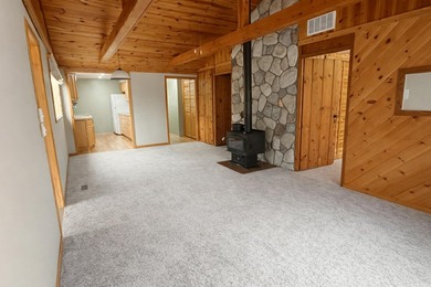 Tucked away in the heart of Up North Michigan, this charming - photo 7