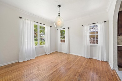 A thoughtfully preserved historic home with its original - photo 9