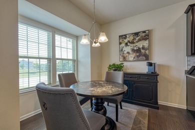 Enjoy low-maintenance living in the highly desirable River Falls - photo 2