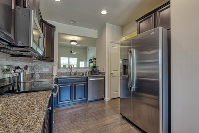 Enjoy low-maintenance living in the highly desirable River Falls - photo 8