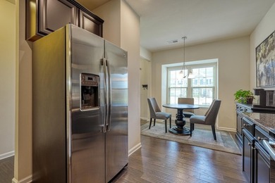 Enjoy low-maintenance living in the highly desirable River Falls - photo 9