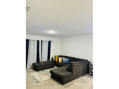 Welcome to this charming three-bedroom, two-bathroom residence - photo 6