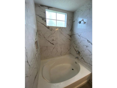 Simply Stunning!! Sought after and rarely available 3 bed 2 bath - photo 11