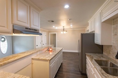 Completely updated 4BR, 2BA home near Lake Wichita! Open floor - photo 12