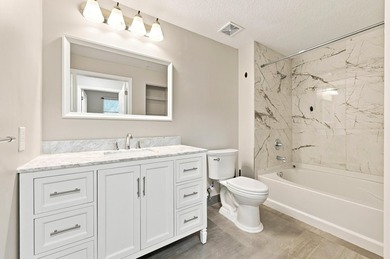 Simply Stunning!! Sought after and rarely available 3 bed 2 bath - photo 27