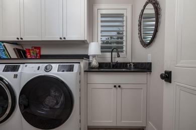 Amazing custom built home in the sought after gated community at - photo 34
