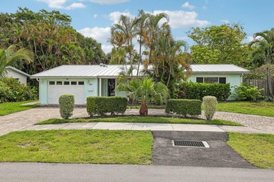 Welcome to 500 SE 8th Avenue, a beautifully updated 2-bedroom - photo 1