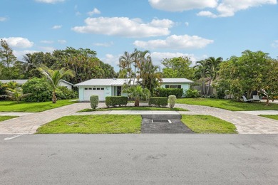 Welcome to 500 SE 8th Avenue, a beautifully updated 2-bedroom - photo 3