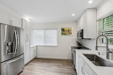 Welcome to 500 SE 8th Avenue, a beautifully updated 2-bedroom - photo 6