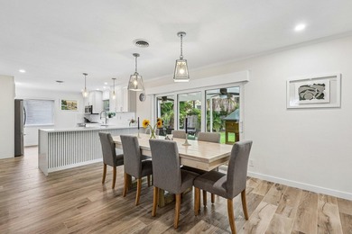 Welcome to 500 SE 8th Avenue, a beautifully updated 2-bedroom - photo 9