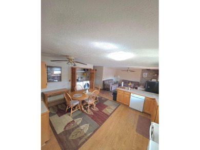 117 ft on the canal of Houghton Lake in a highly sought-after - photo 5
