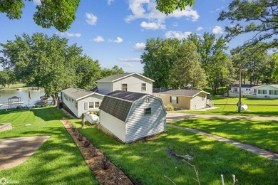 This fully furnished 4-bedroom, 2.5 bath home sits directly on - photo 2